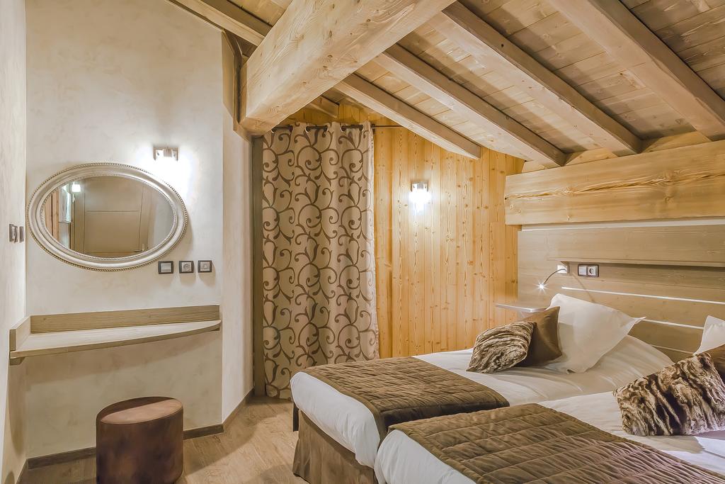 A twin bedroom at Les Balcons Platinum Val Thorens