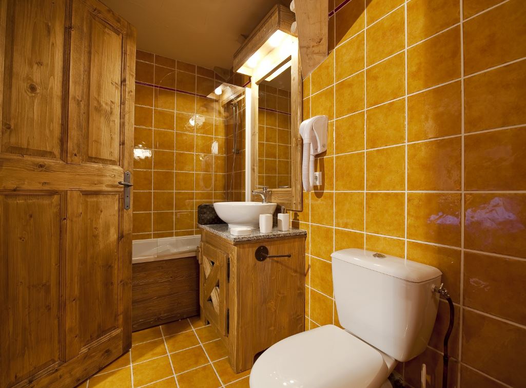 One of the bathrooms with a bath