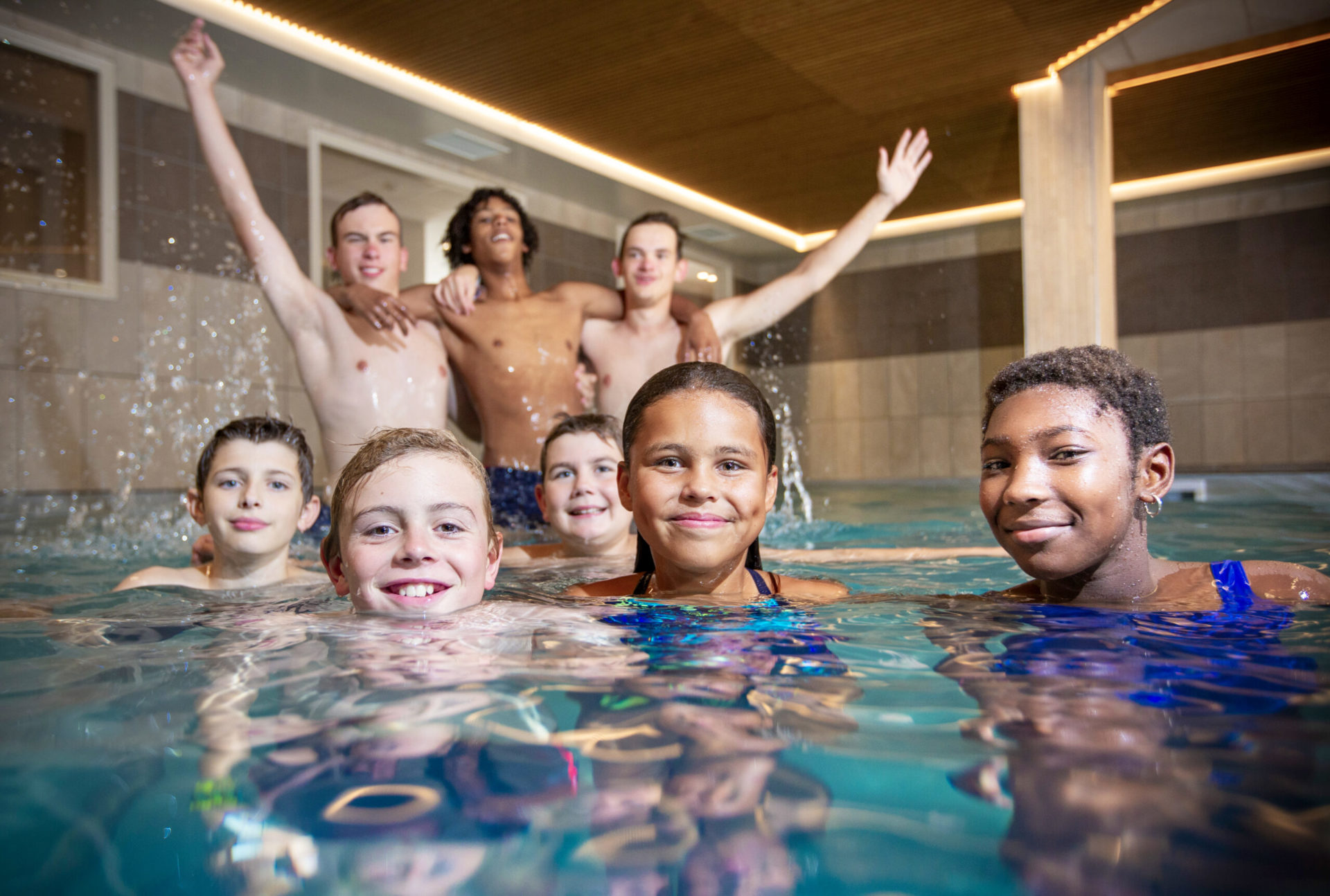 An image of children enjoying the indoor swimming pool