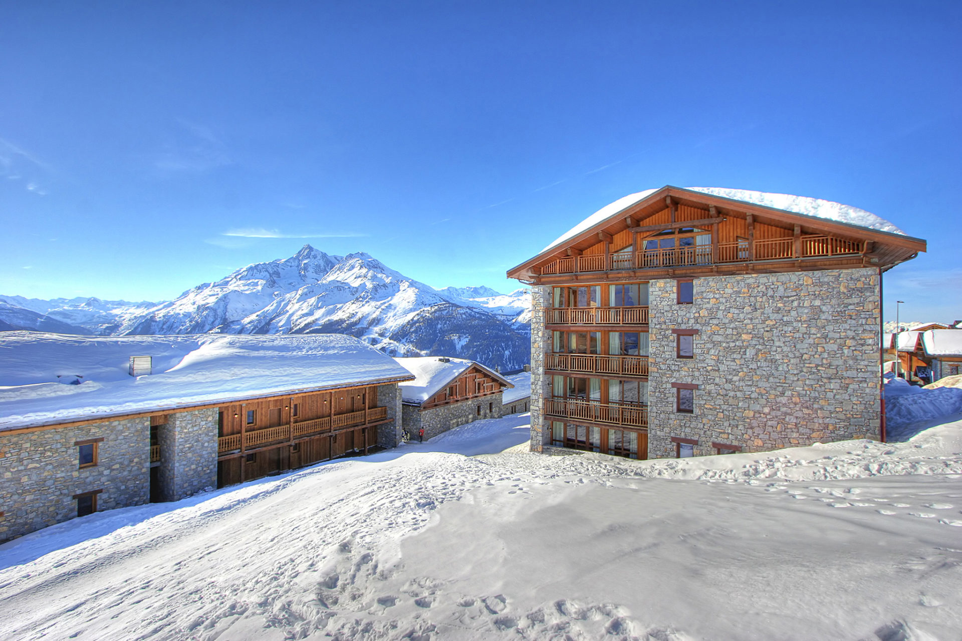 An image of the exterior of Les Balcons de la Rosiere in the daytime