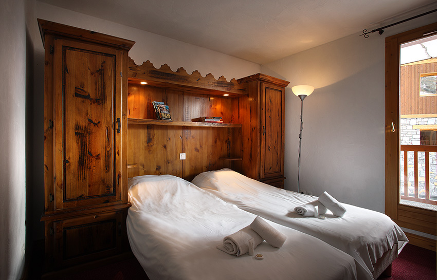 An image of a bedroom at Chalets des Neiges Plein Sud Val Thorens