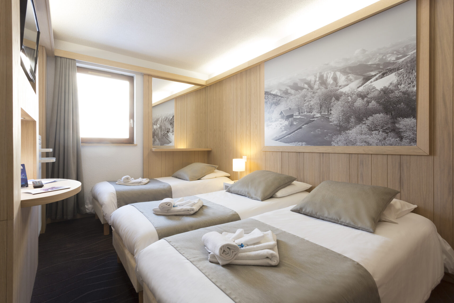 An image of one of the triple rooms at Hotel Club MMV Les Bergers