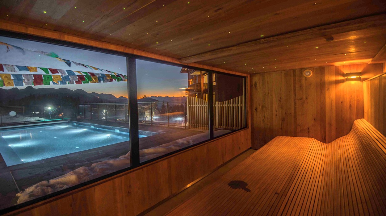 The sauna overlooking the outdoor pool at Edenarc